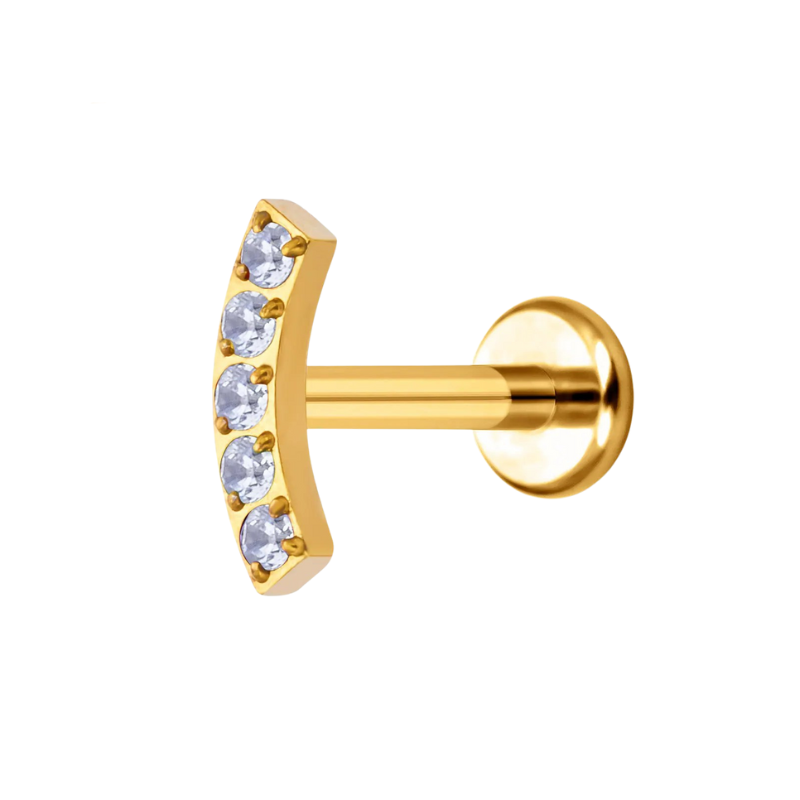 Bijou d'oreille barbell en titane, scintillement subtil.