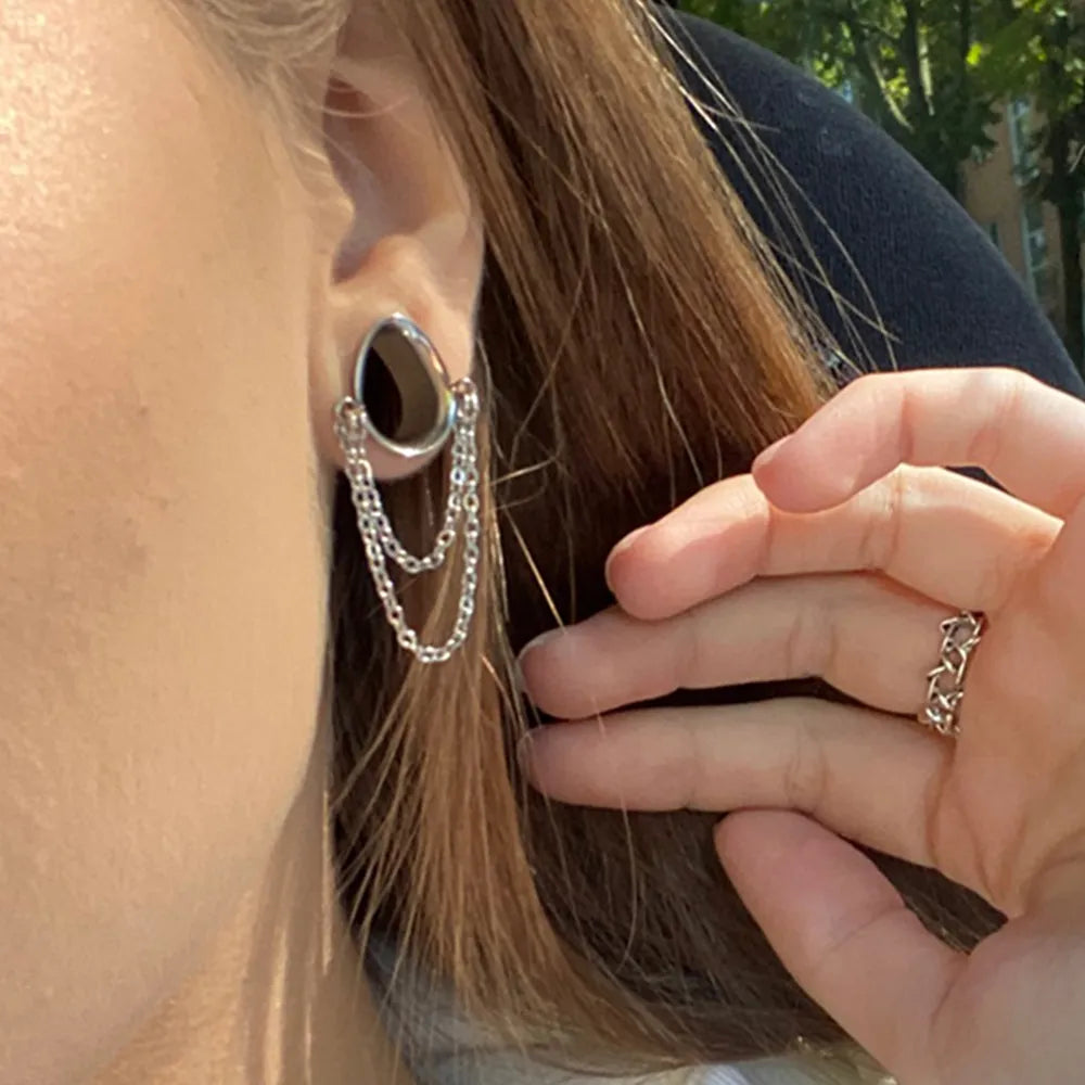 Plug tunnel oreille, chaînes pour un style unique et accrocheur.