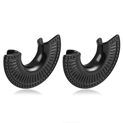 Plugs d'oreilles avec motif éventail égyptien raffiné.