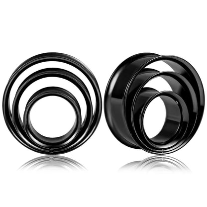 Accessoire d'oreille plugs cercles en noir.